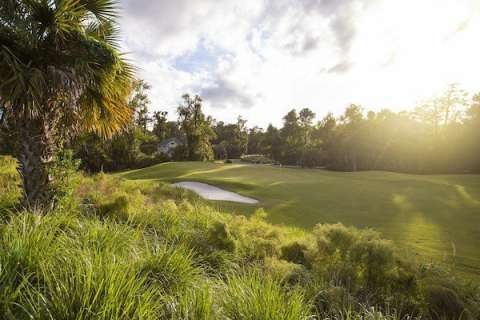 golf course with sunset