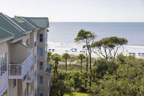 View of the beach from a balcony at Hampton Place Villas