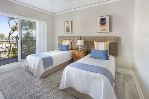 Bedroom with twin beds at Hampton Place Villas