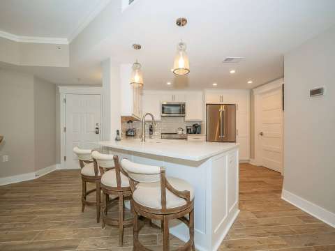 Kitchen with eat-in bar at Hampton Place Villas