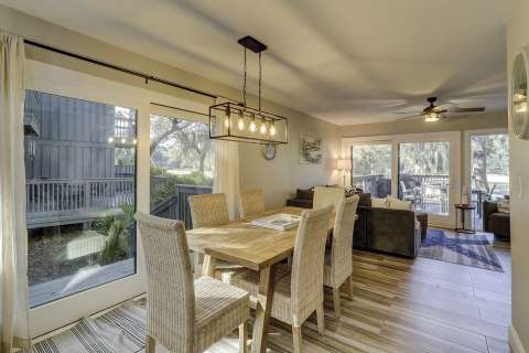 Dining room and living room with access to the porch at Hickory Cove