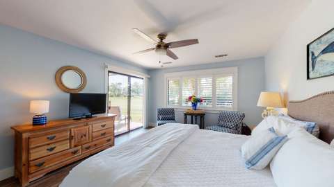 Bedroom with porch access at an Inverness Village villa