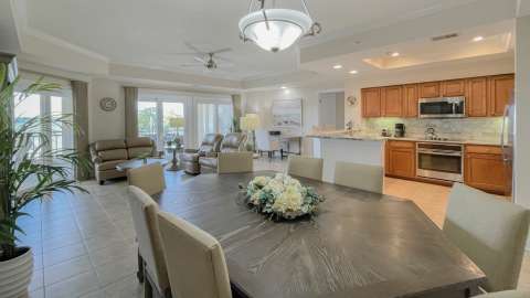 Dining, kitchen, and living area at a Mainsail villa