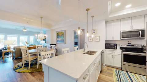 Kitchen, Dining, and living area at a Mainsail villa