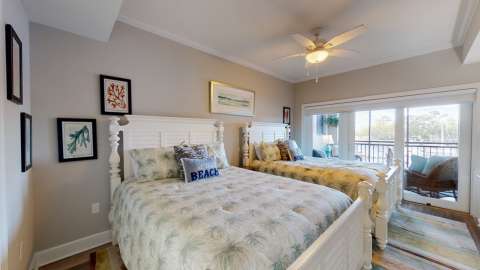 Bedroom with two beds at a Mainsail villa