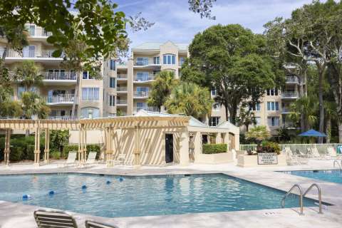 Community pool with beach at Windsor Place