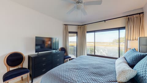 Bedroom in a villa at Captain's Quarters