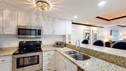 Kitchen at a villa at Captain's Quarters