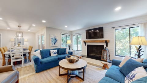 Living room with dining room at Fazio VIllas