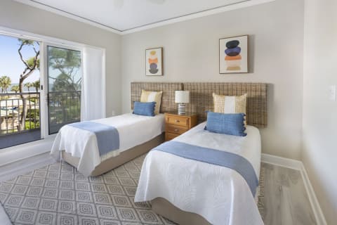 Bedroom with twin beds at Hampton Place Villas