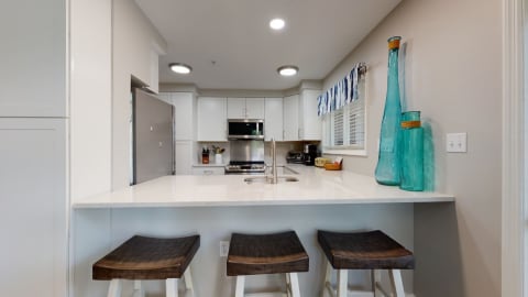 Kitchen with eat-in bar at Huntington Villas