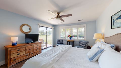 Bedroom with porch access at an Inverness Village villa