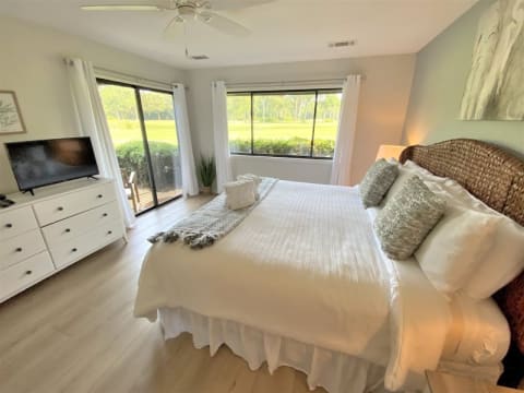 Bedroom with porch access at an Inverness Village villa
