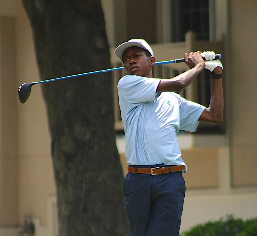 Young Male Golfer Swinging a Golf Club at Arthur Hills