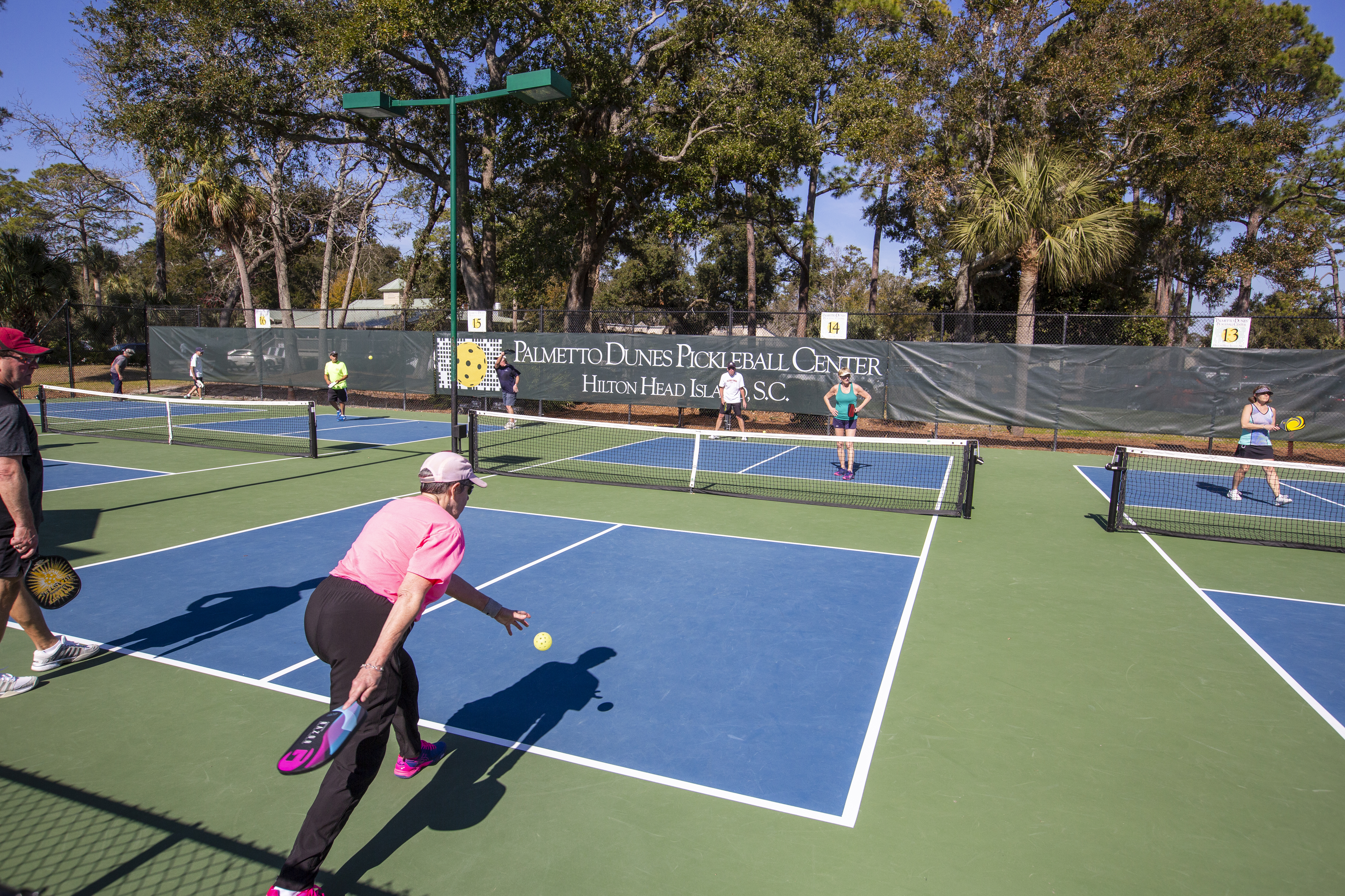 pickleball players on courts