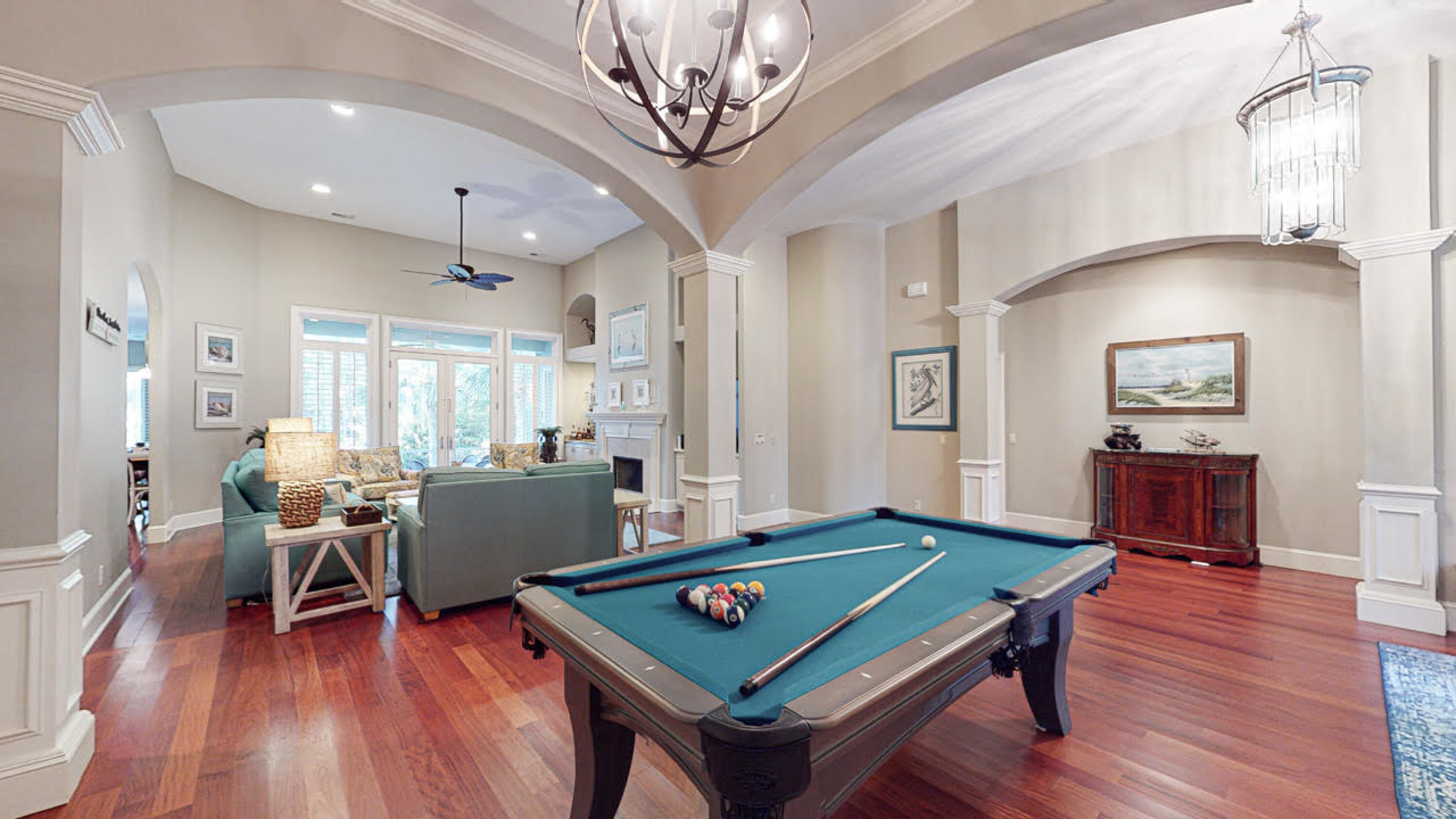pool table and living room in a private vacation rental