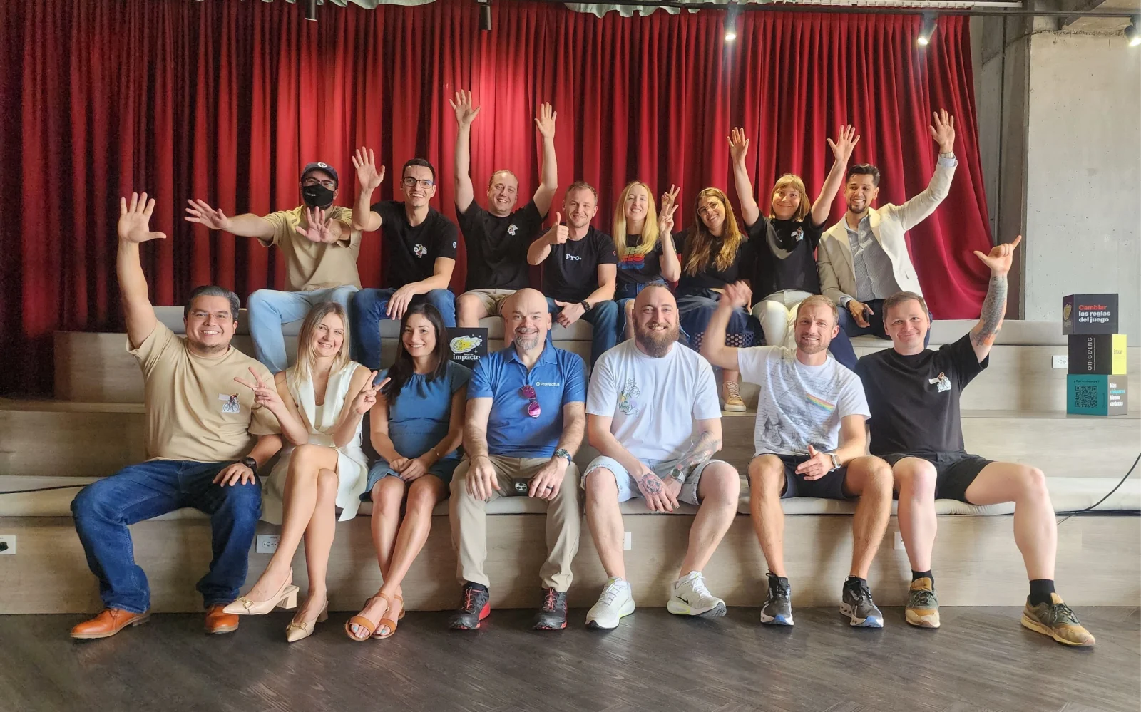 Provectus team on stage celebrating together
