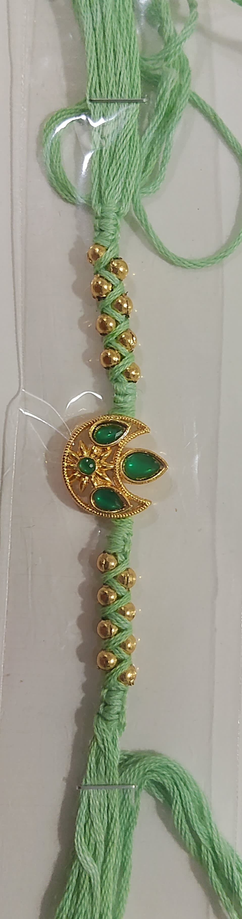 Pastel green Kundan with golden beads