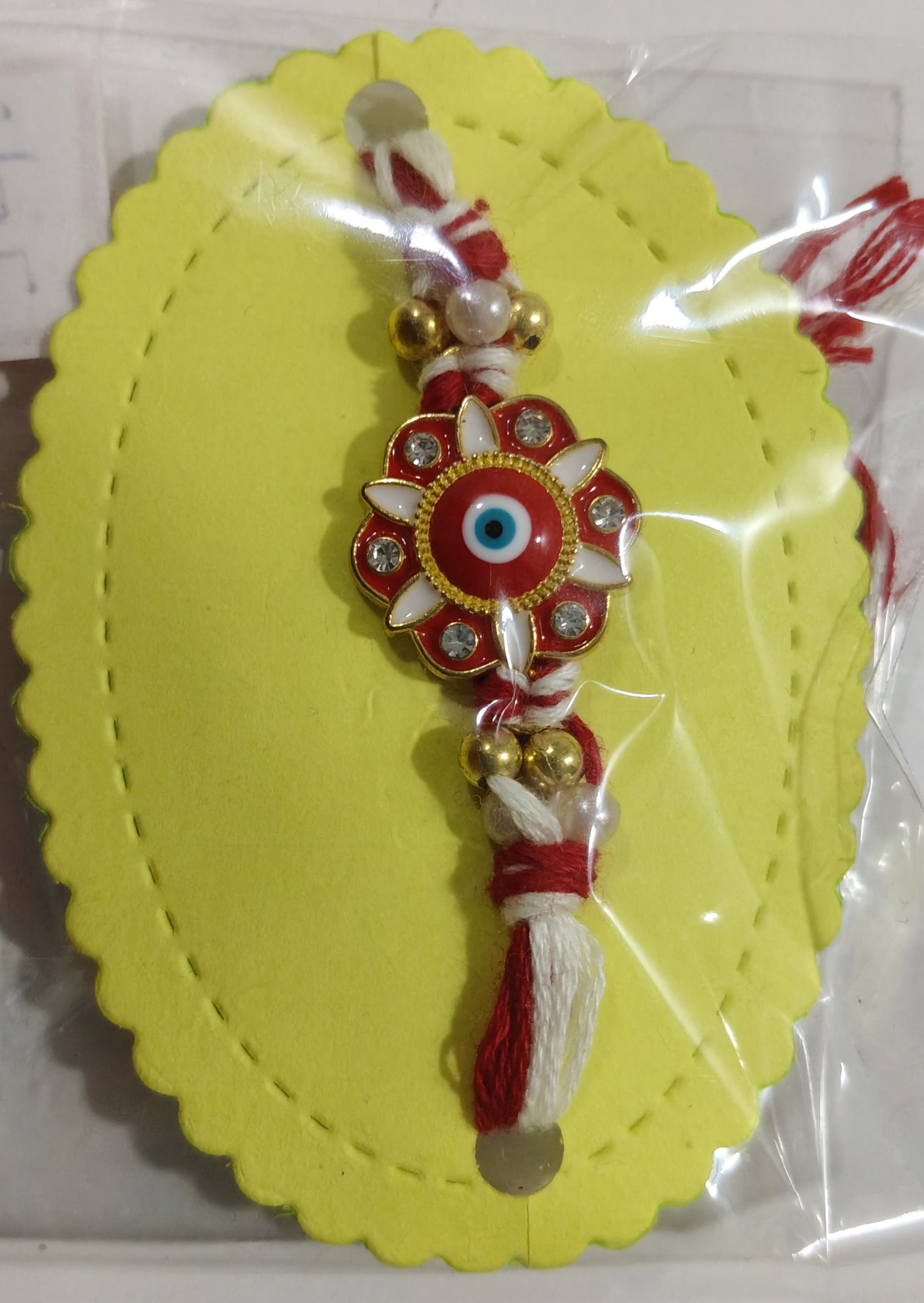 Red motif rakhi