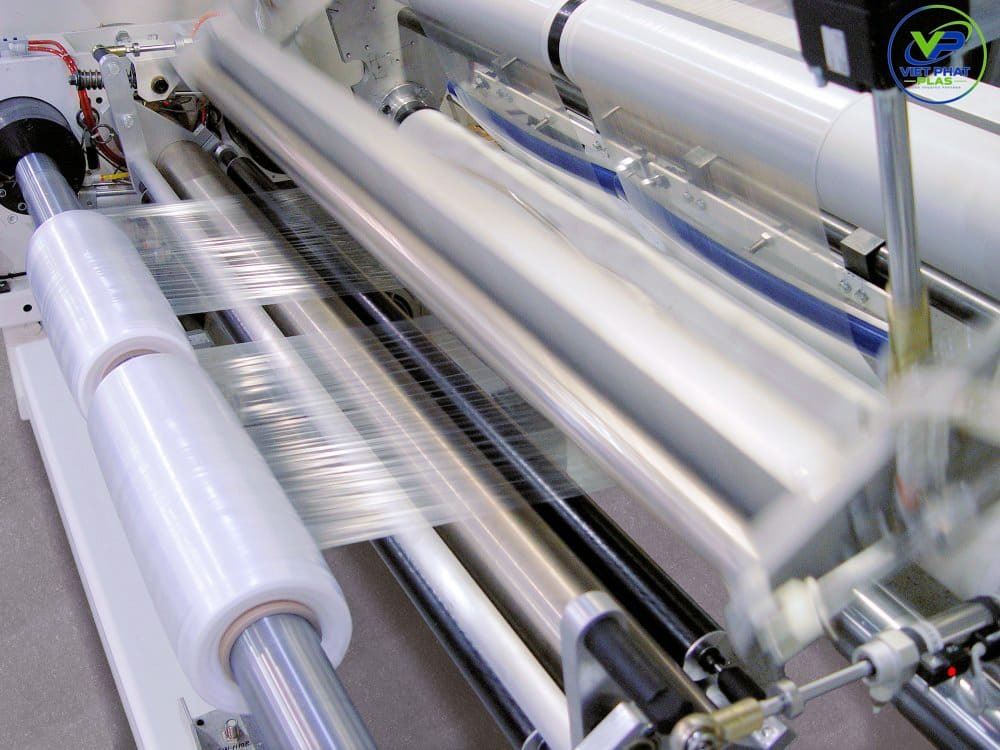 Industrial PE food wrap film roll on packaging dispenser at VietPhatPlas