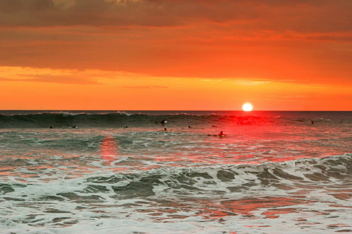 Costa Rica sunrise surf lineup beginner intermediate waves