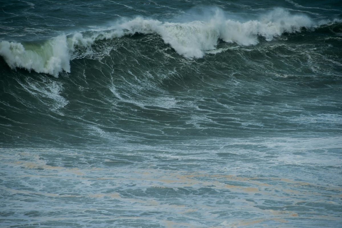 Nazaré Portugal big wave tow-in surfing aerial view