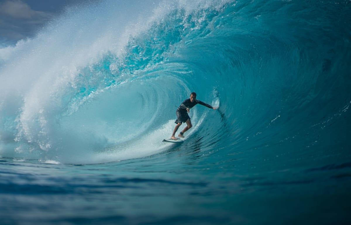 Mentawai Islands reef break barrels turquoise water surfer tube
