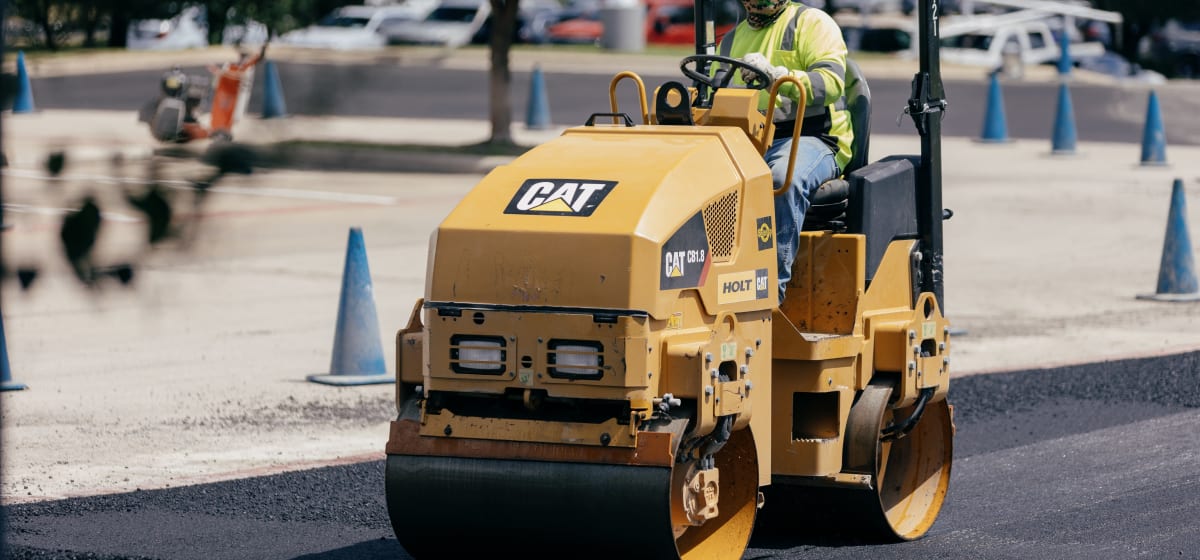A crew working a paving and striping job in the Hill Country.