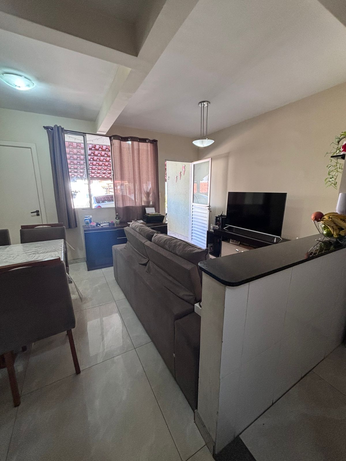 Foto 3 de Excelente casa geminada em condomínio no bairro Arvoredo II.
