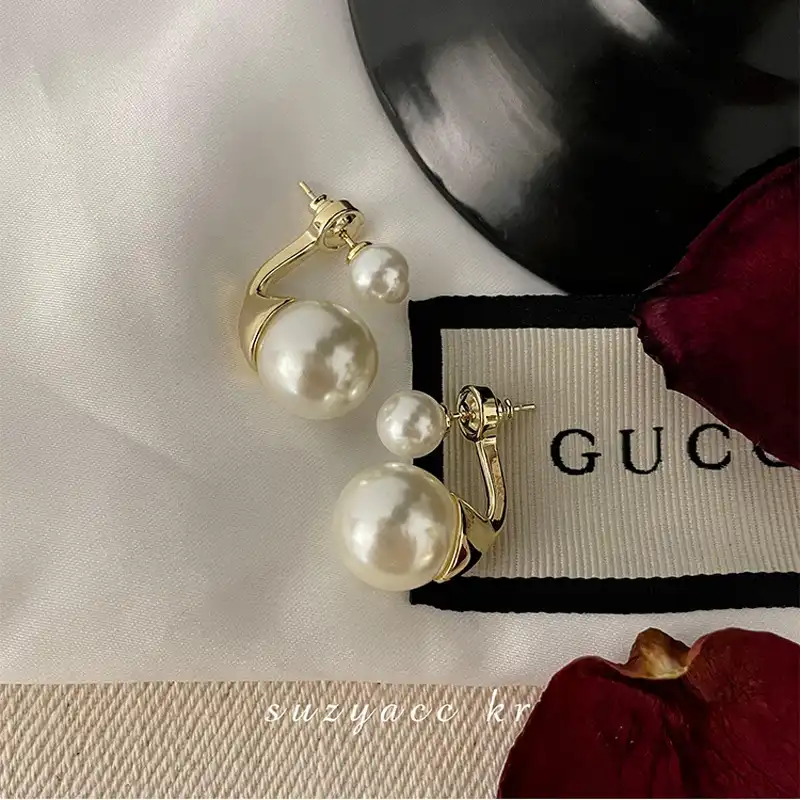 A pair of classic pearl stud earrings