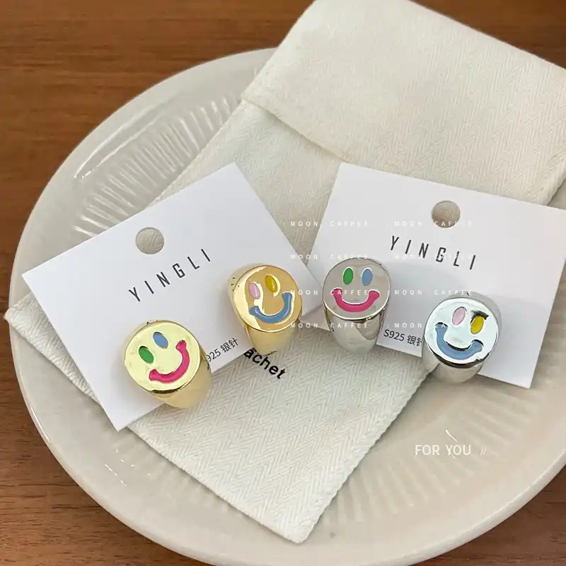 Design sense metal smiling face enamel drop glaze C-shaped earrings 