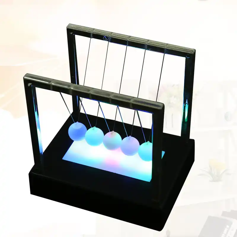 Colored glowing Newton cradle gift