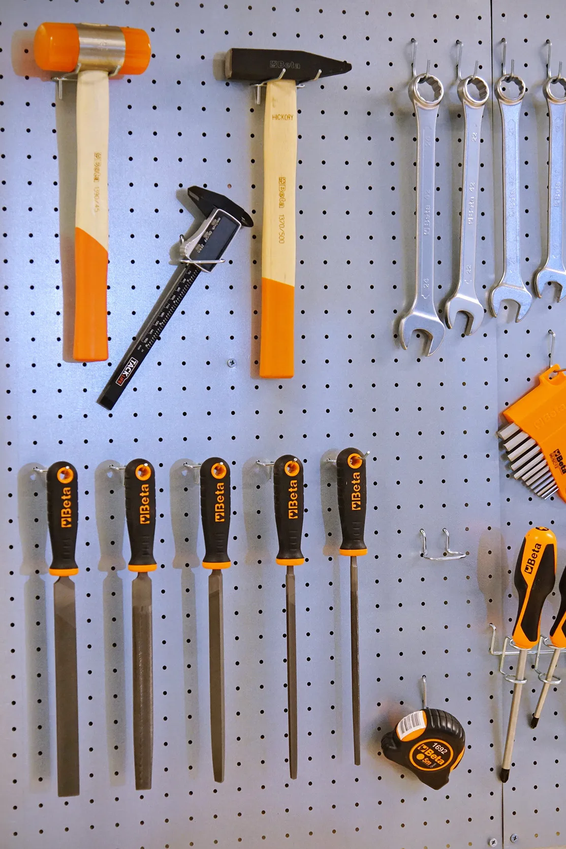 Hand tools nicely organized at wall board