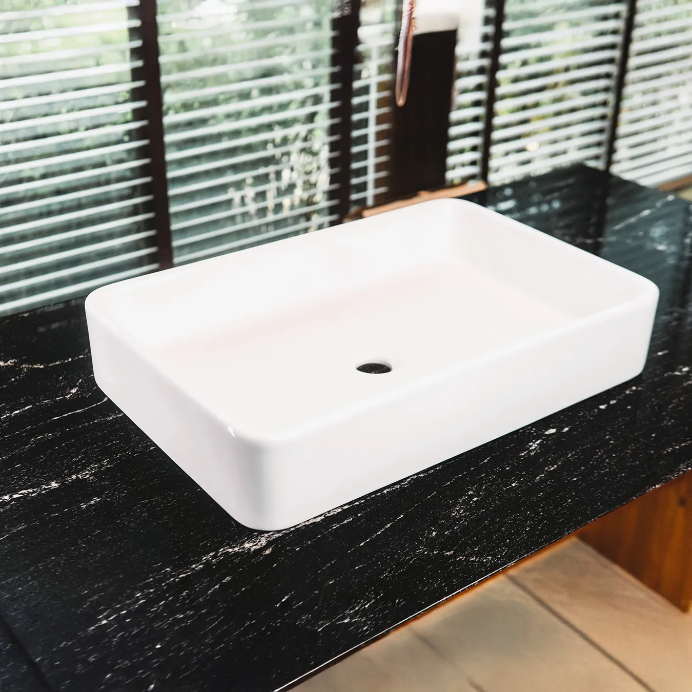 Tampa sink in a well lit, modern bathroom