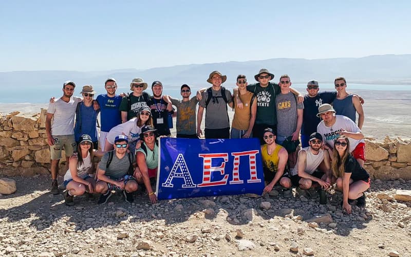 Cooper Myers with a group of his AEPi fraternity brothers on top of Masada on Birthright Israel in 2019