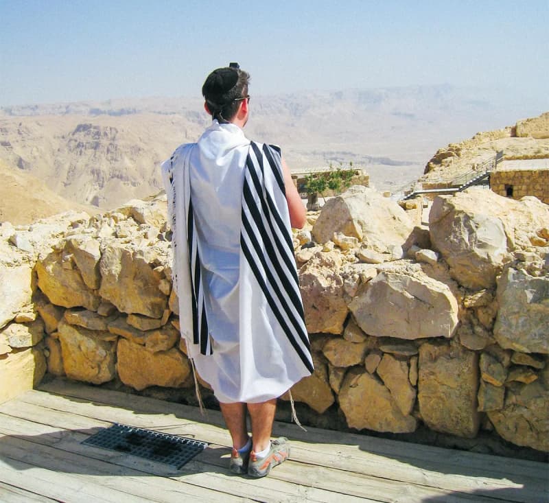 David Bitton, 2006 Birthright Israel Alumnus, praying on top of Masada