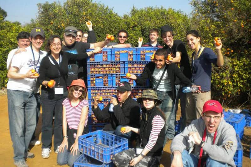 Eren in an orange grove during his Birthright Israel trip.
