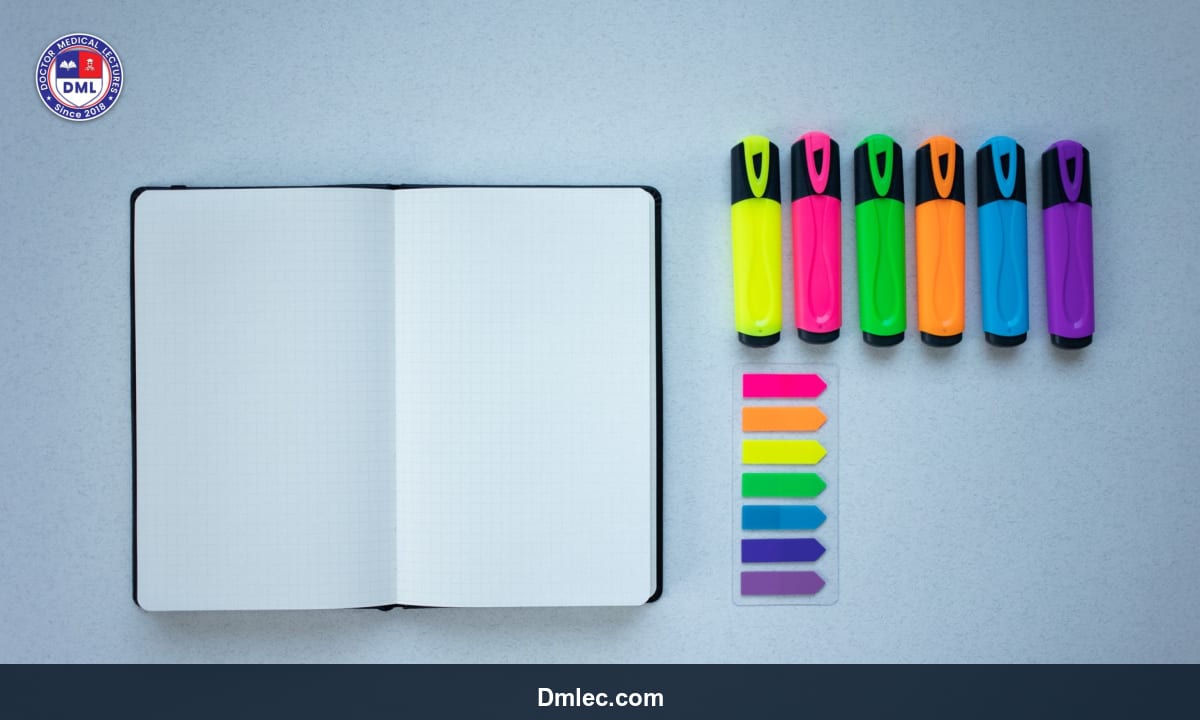 Close-up of a student’s notebook with highlighted notes on clinical subjects