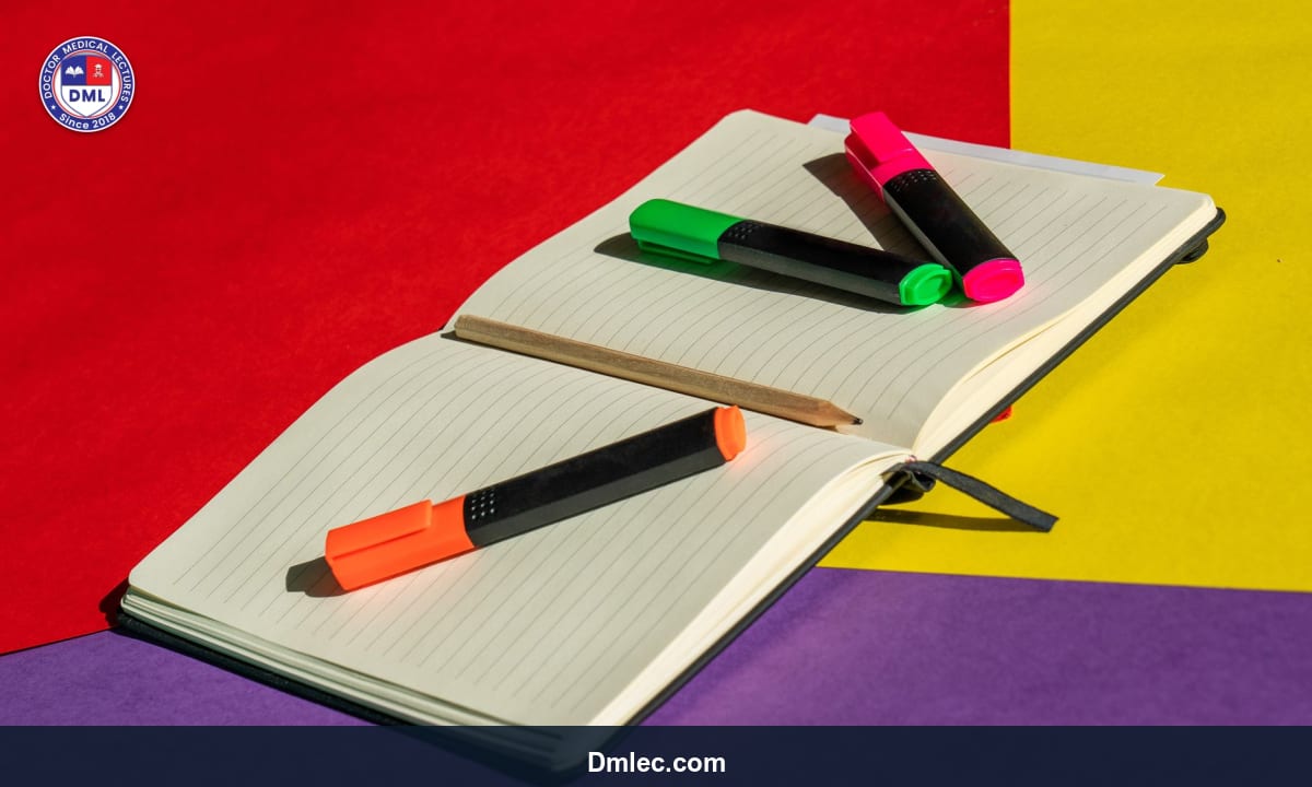 Close-up of a medical student's notebook with highlighted notes and a pen during study