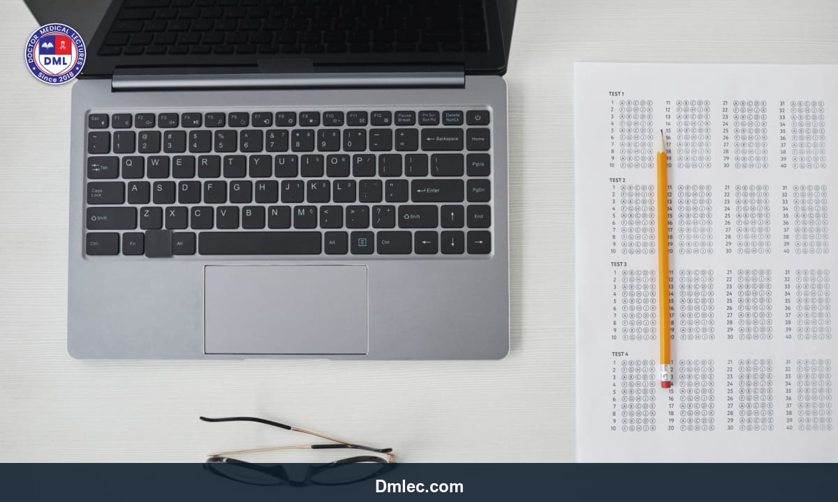Close-up of hands uploading documents on laptop for online exam registration