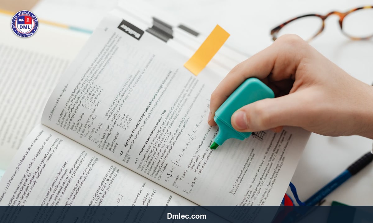 Close-up of study notes highlighted with colorful markers and a pen on a desk