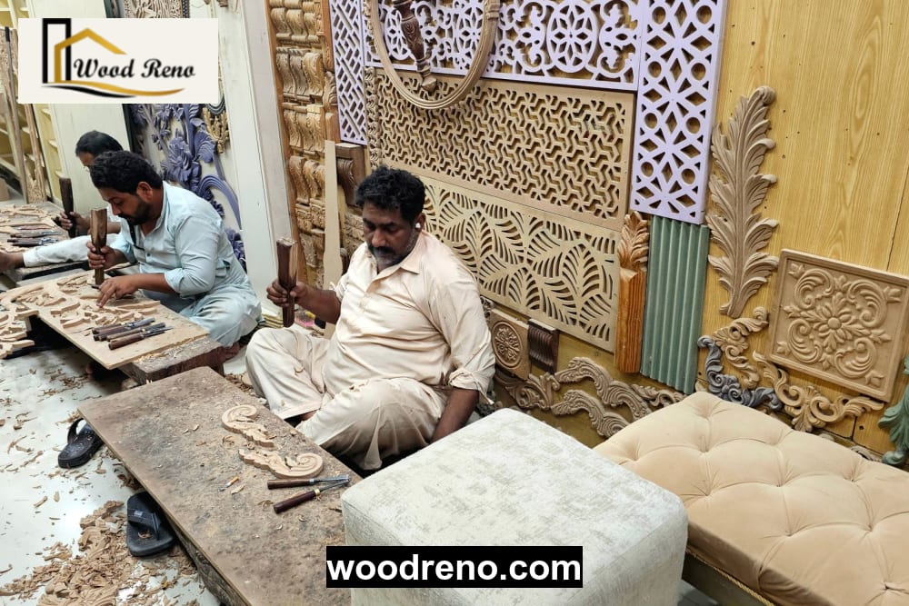 Skilled craftsmen at a Pakistani woodworking workshop assembling and inspecting built-in wardrobe components