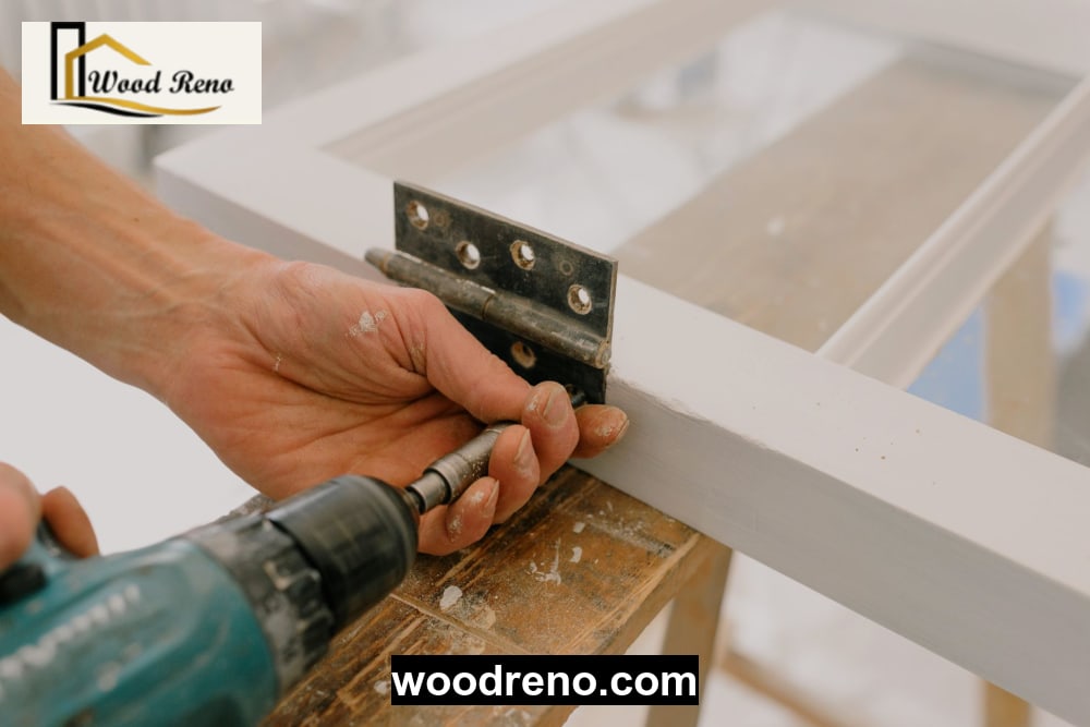 Close-up of a craftsman carefully repairing the wooden frame of a sofa in a workshop in Islamabad