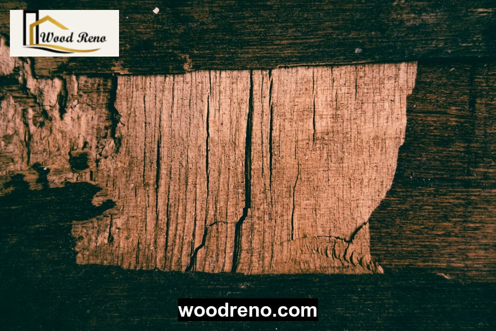 Close-up of a wooden bed frame with visible cracks and loose joints before repair