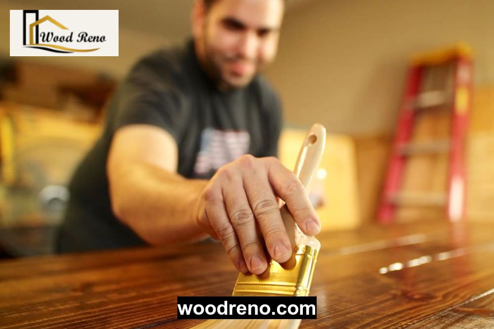 Woodreno workshop experts applying door paint and polish on wooden doors, demonstrating surface preparation and application techniques