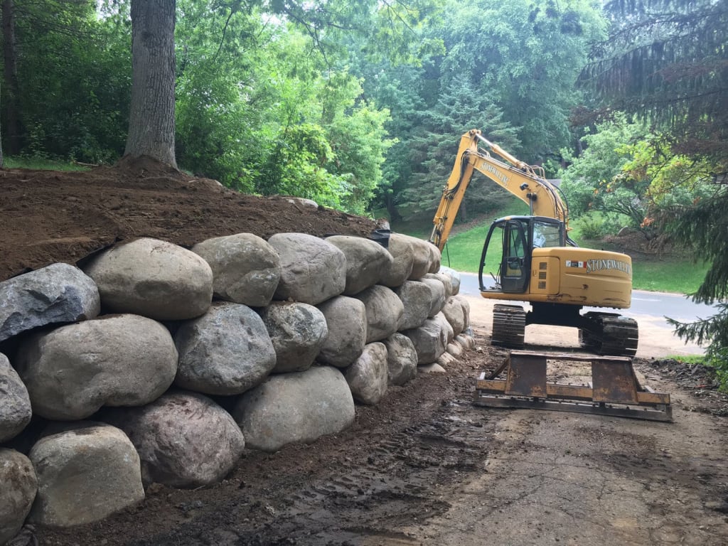 Final touch: boulder retaining wall