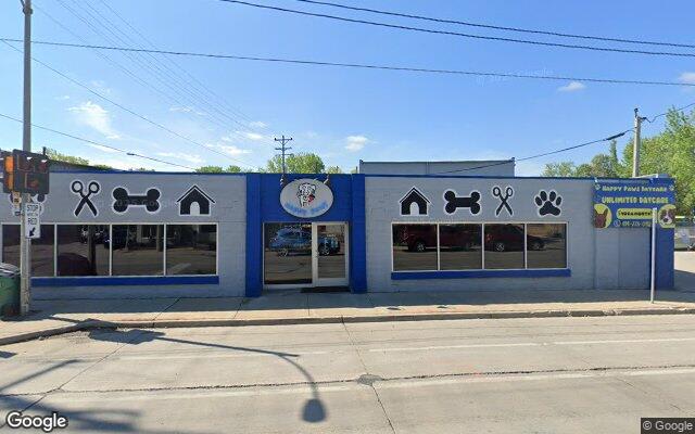 Street-level view near Happy Paws Grooming & Daycare