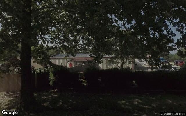 Street-level view near Canine Country Club of Arkansas