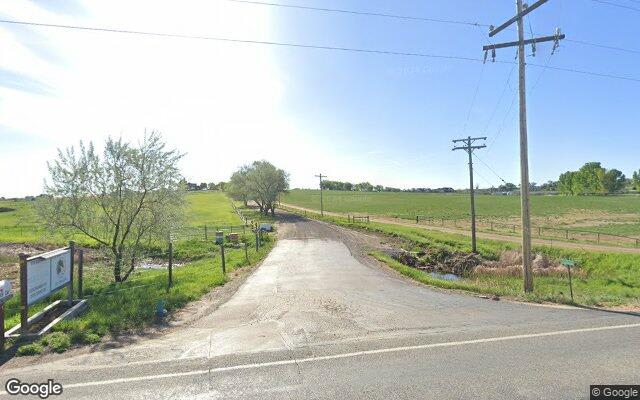 Street-level view near Happy Tails Dog Ranch