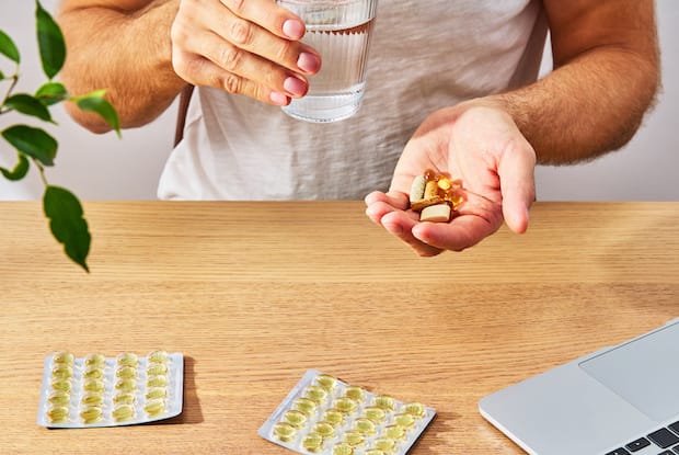 a man taking many medications at the same time
